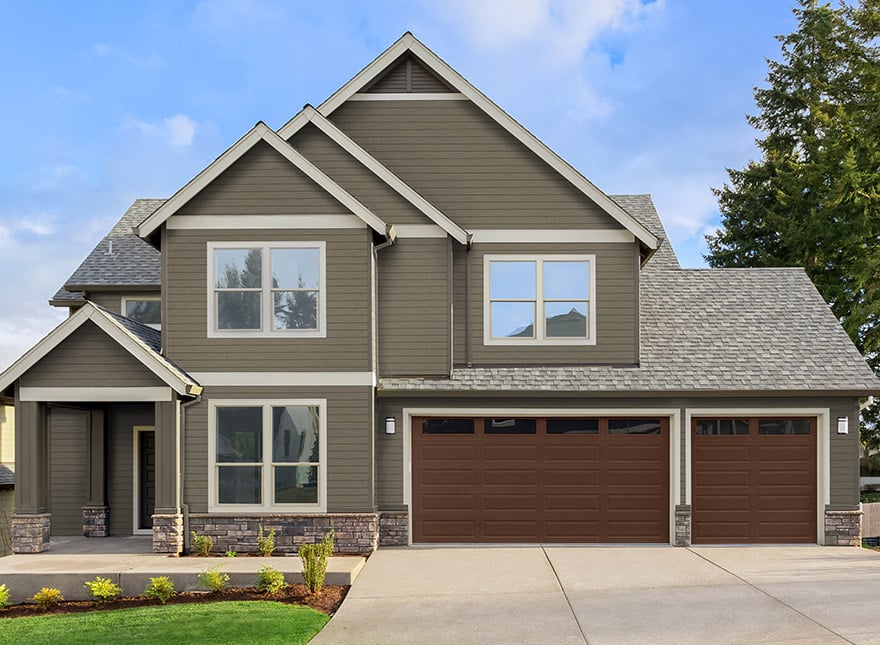 Gray suburban home with ColoRISE Rise siding